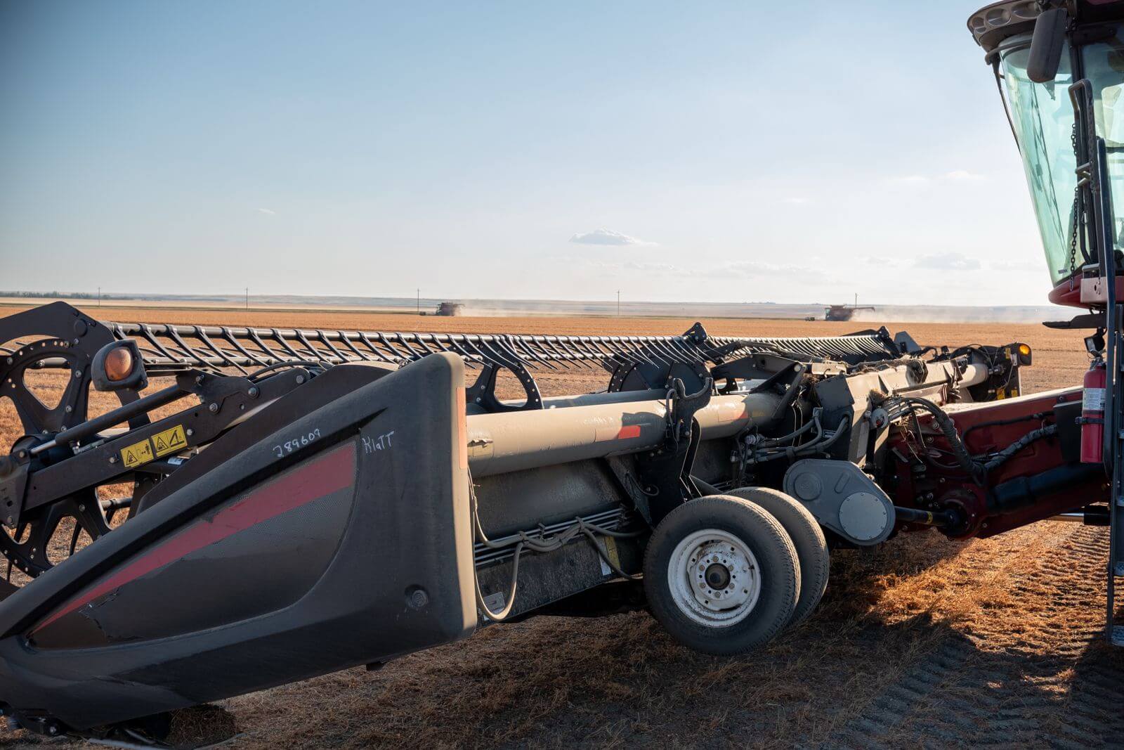 Combine harvesting equipment in a field at harvest time